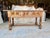 This 19th Century Walnut Console Table was handcrafted in Italy in the late 1800's. The piece features a 1.5 inch single...
