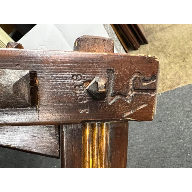 Pine arts & crafts style bench with carved details.