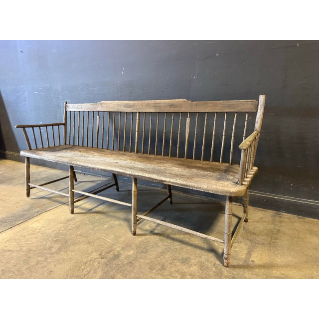 19th Century Spindleback Windsor Deacon's Bench. Great patina. Dimensions are 35.5 in h x 77.5 in w x 22.5 in d. Good used...