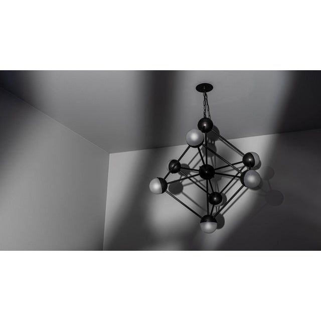 An elementary mesh of crystallized iron describes the spirit of a bright future– the late 1950s provides inspiration for...
