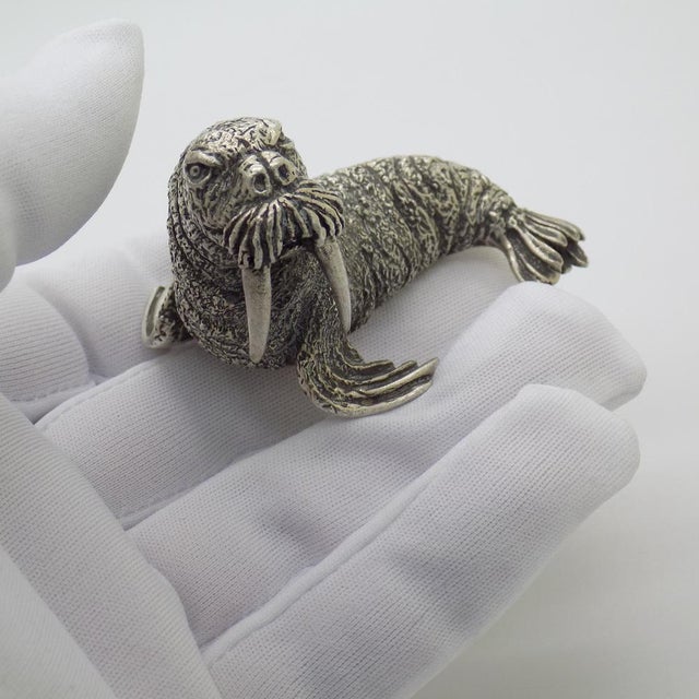 An elegant and substantial vintage miniature depicting a walrus, handcrafted in Arezzo (Tuscany) between the 1950s and...