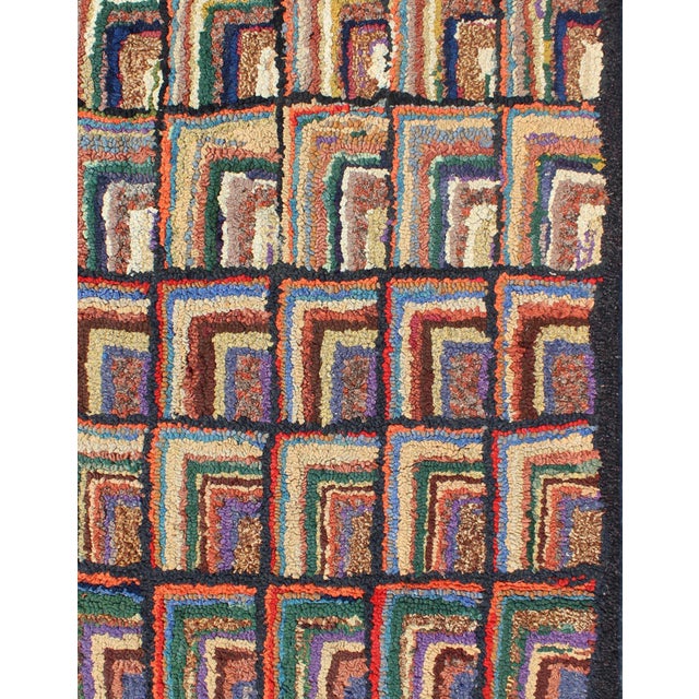 American Hooked rug create an illusion of depth and texture. The beautifully colorful checkerboard pattern plays like a...