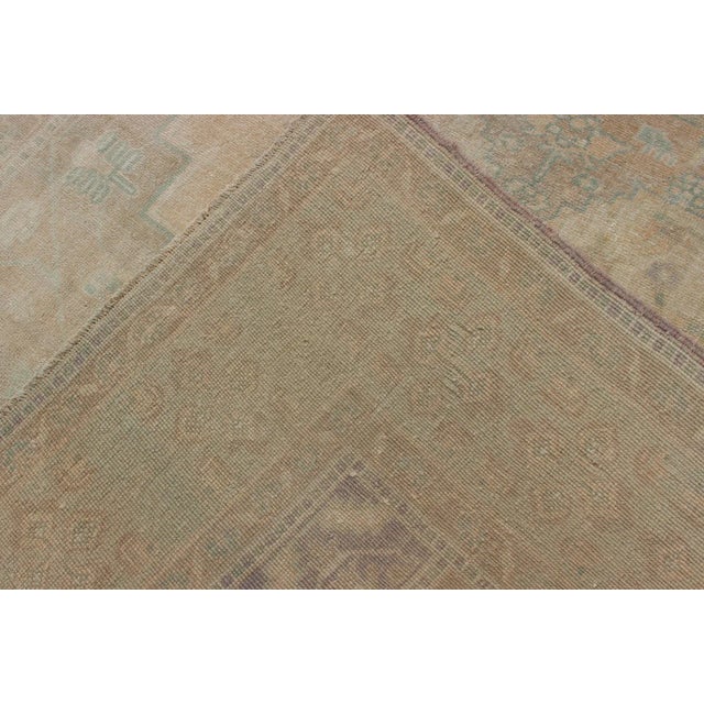 Faded Turkish Hand Knotted Oushak With Medallion With Muted Colors of Tan, Muted Light Peach For Sale - Image 12 of 13