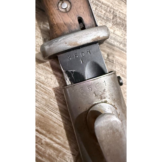 WW2 German Military issued bayonet and matching scabbard. Markings say Carl Eickhorn, and serial #3501 an and indicate it...