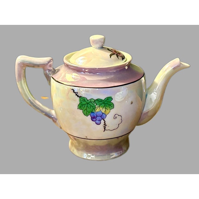 Vintage 1950s Iridescent Porcelain Tea Pot. Hand painted lusterware in beautiful colors, bird motif. Great vintage...