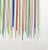 Here is a vibrant drawing of multicolor stripes of burnt orange, cobalt blue, light green, magenta, gray and beige set in...