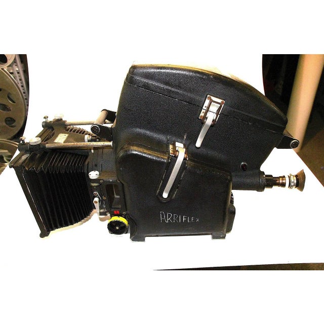 Submitted for your consideration, this 1950s Arriflex 35mm Feature Motion Picture Film Camera with the factory correct...