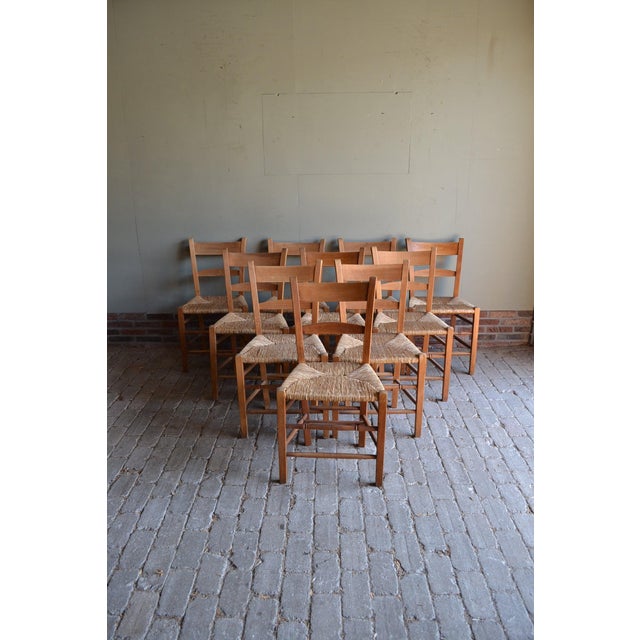 of 20th-century Dutch oak church chairs. The height is 85 cm. The width is 48 cm. The depth is 40 cm. The seat height is...