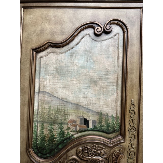 Romantic hand painted Ernest Hemingway bombe wardrobe cabinet by Thomasville. The armoire is finished in a rich tone, with...