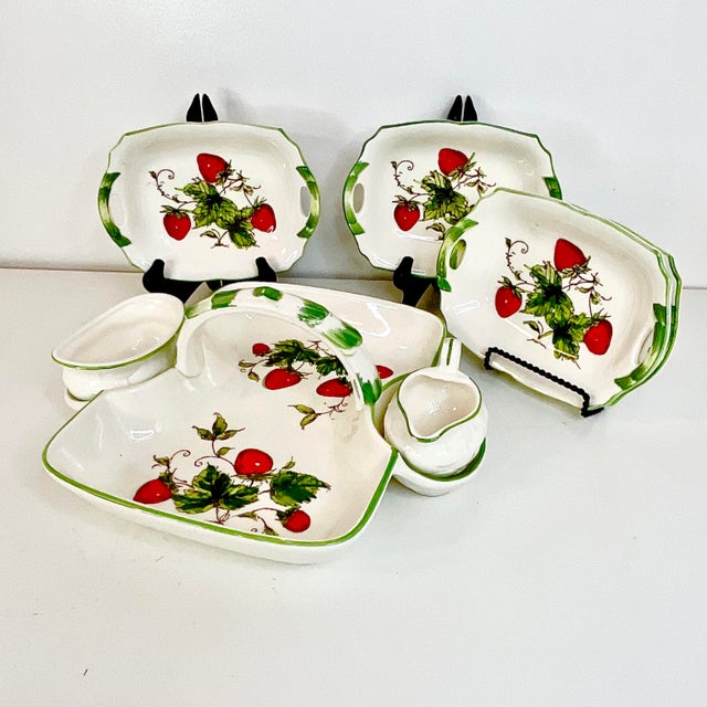 This is a fabulous vintage find. It’s from the 1950s and is for serving fresh strawberries with cream and sugar. The set...