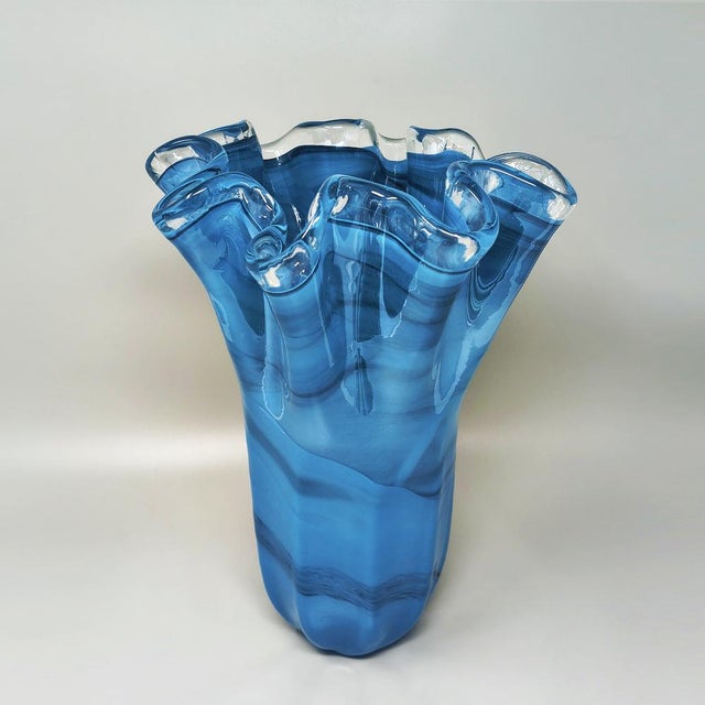 This sophisticated Murano glass vase was handcrafted in Italy during theby the renowned glassmaker Dogi. The piece...