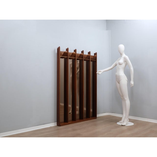 Are you looking for a unique, trend-setting vintage piece to transform your entryway or hallway? this 1970s wall-mounted...