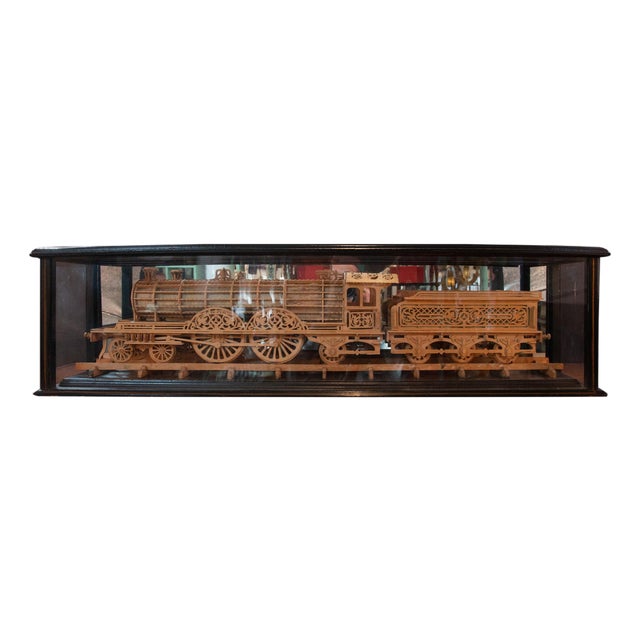 Carved Wood Model of a Locomotive in Black Lacquered and Glass Case For Sale