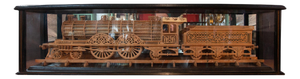 Carved Wood Model of a Locomotive in Black Lacquered and Glass Case