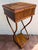 Vintage bamboo and rattan plant stand features a unique burnt finish and a small drawer can also be used as a side table