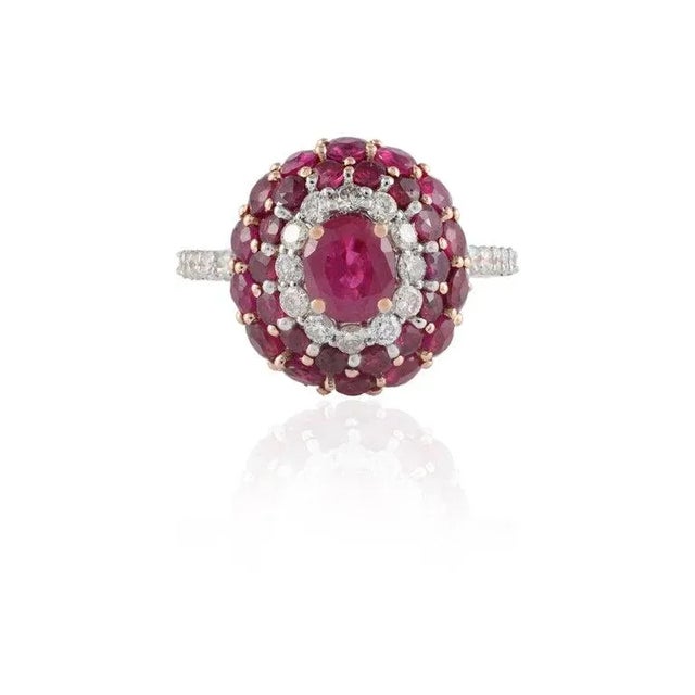 This is part of Chairish’s Fine Jewelry assortment. Natural Ruby Cluster Ring with Diamonds in 14k gold featuring natural...