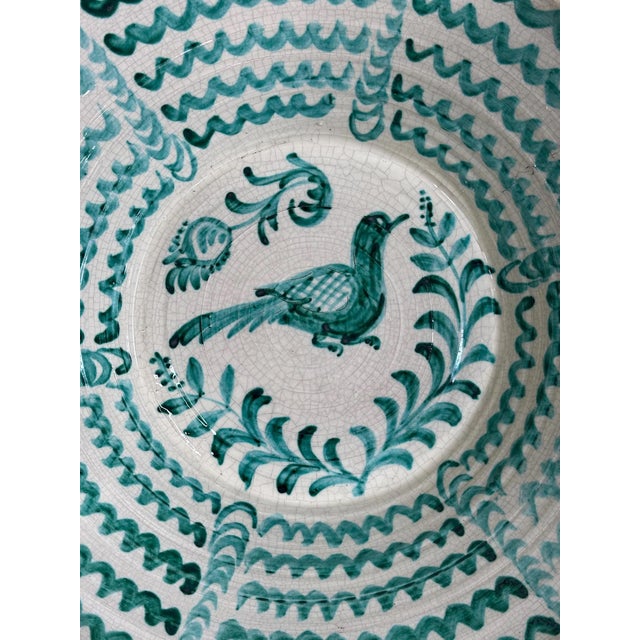Large Spanish handmade and painted white and green glazed terracotta "Lebrillo" earthenware bowl in the style typical of...