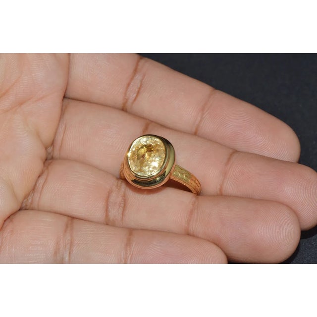 GIA certified 18K solid gold 8.40CTS Ceylon sapphire solitaire bezel ring. The high dome design of this ring with the...