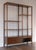 Rare and beautiful bookcase designed by Paul McCobb in the 1950s for Winchendon. Walnut finish over solid maple wood.