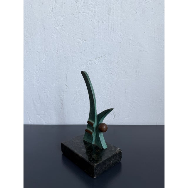Modern patinated bronze abstract sculpture on granite base circa 1980s. Signed by unknown artist circa 1980s.