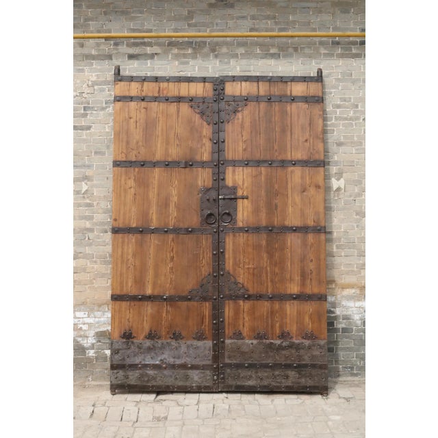 This vintage door was used as the gate door to the court yard and still has its original iron hardware, butterflies, door...