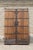 This vintage door was used as the gate door to the court yard and still has its original iron hardware, butterflies, door...