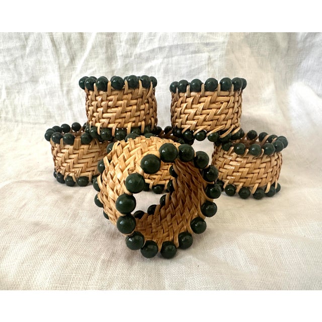 Set of 6 handmade woven napkin rings with green beads. Handmade by artisans who reside and work in remote villages in the...