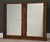 A mid century modern brutalist mirror. Made in USA. Circa 1970’s. Excellent condition. 55” wide. 2” deep. 40.5” tall.