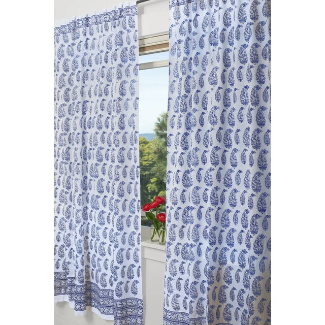 The Malabar Multi-Paisley pattern displays medium and small intricate paisleys with vines and flowers reminiscent of...