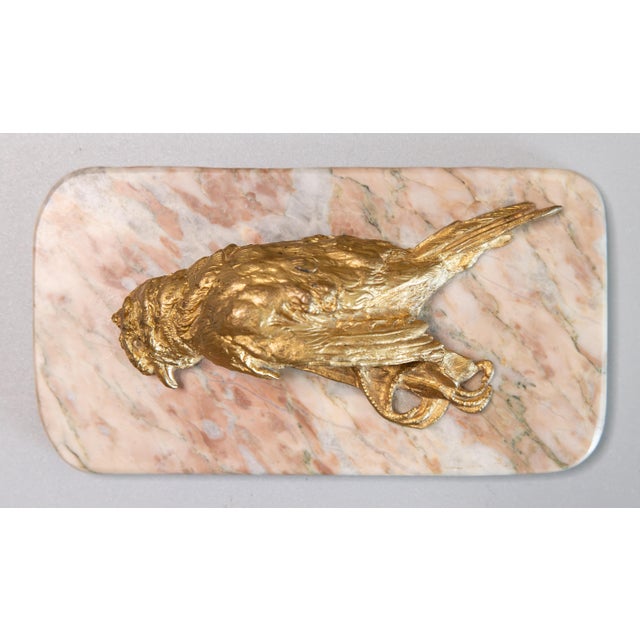 A 19th century antique wounded sparrow bird paperweight/hunting trophy in chased gilt bronze, after Comolera (1818-1897)....