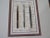 Framed Print of Writing Pens. New Floor Model Condition: Excellent Clean Original Finish & Condition Size: 19.5w x 24h...