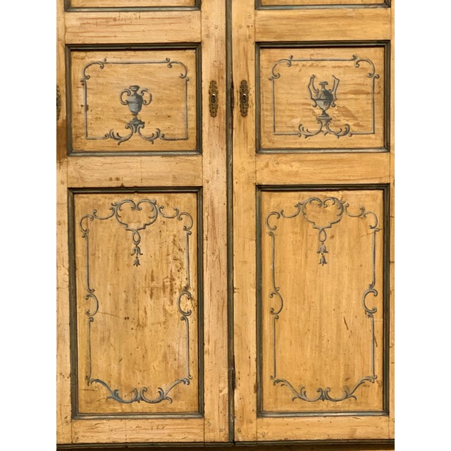 A lovely neoclassical French painted armoire France or Italy early 19c possibly late 18c. You don’t see these often.