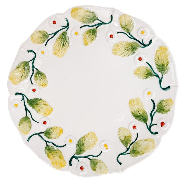 Set of four vintage Italian majolica salad plates featuring a striking high-relief, embossed design of lush green leaves...