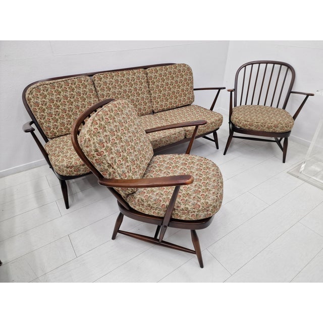 The frames are crafted using traditional ercol techniques, including steam-bent elements and solid wood joinery, ensuring...