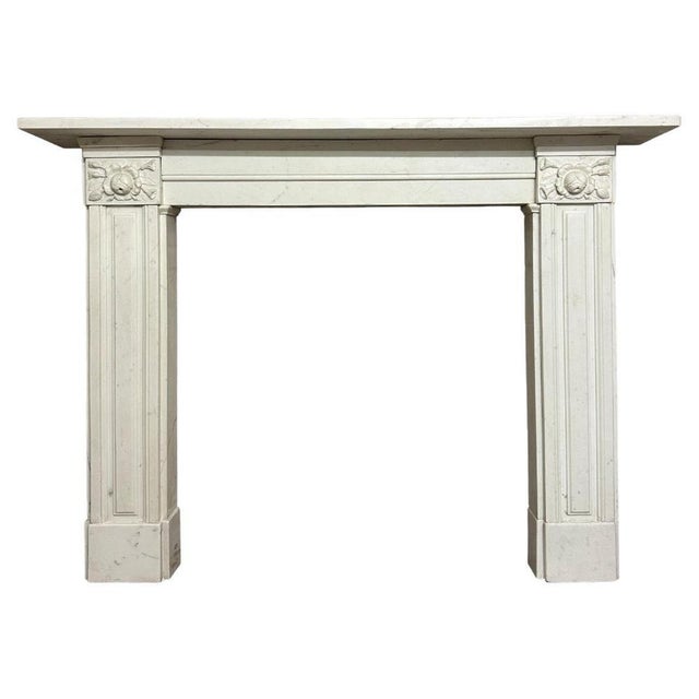 A regency period antique statuary white marble chimneypiece. Superior quality italian statuary marble, no discolouration...