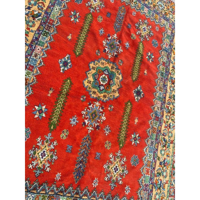 Beautiful Mid-Century Moroccan rug from Rabat, with beautiful geometrical design and nice colors with a pink field color,...