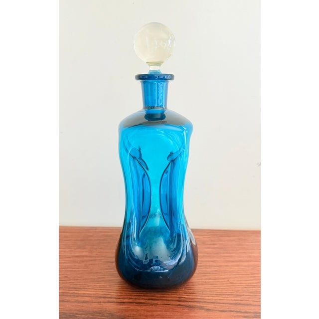 Liquor Decanter by Michael Bang for Holmegaard, 1970s, in Very Good conditions. Designed 1970 to 1979 This piece is...