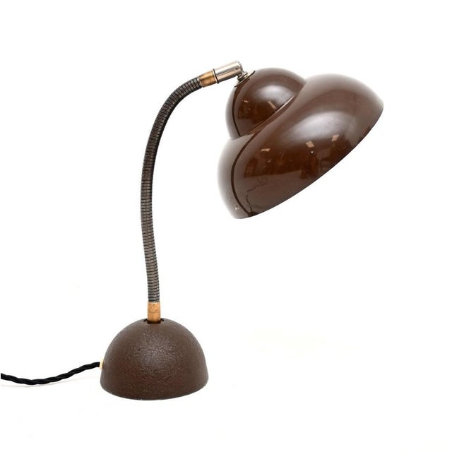 A stylish and extremely well made vintage model 21 desk lamp by Temde. This was made in Germany, it dates from the 1960’s....