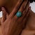 This extraordinary Art Deco style cocktail ring is a bold contemporary jewel inspired by the vivid color, symmetry, and...