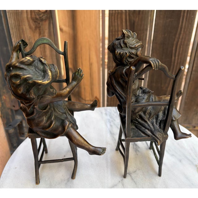 ## Description This exquisite, matching mirrored pair of antique Art Nouveau hot-cast bronze sculptures was created by...