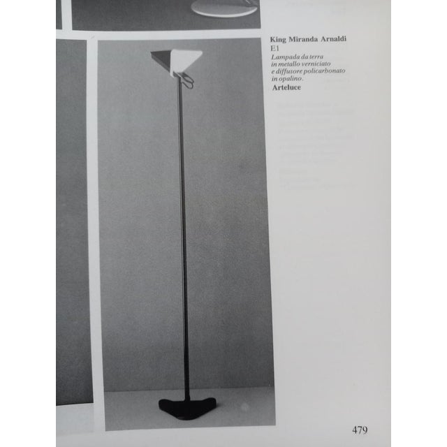 Floor lamp from 1979, produced by Arteluce, working, in metal and plastic diffuser. Unfortunately, the diffuser was broken...