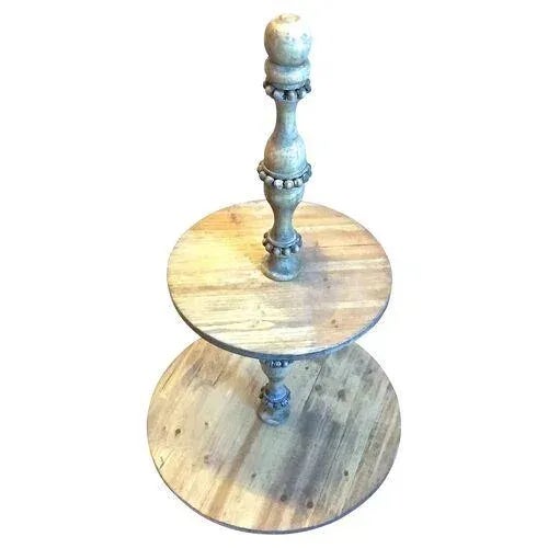 Vintage wood two tiered pastry server with turned wood center posts. Top tier measures: 14" Diameter. Bottom tier...