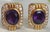 A stunning pair of 18k yellow gold amethyst and diamond earrings with Omega backs. Each earring has one 14mm x 11mm oval...