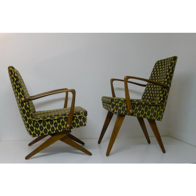 - 1950s pair of unusual lounge chairs with arms - Elevator-type chairs with a spring mechanism and scissor legs - Useful...