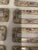 Pretty set of 8 Dresden decorated porcelain place card holders. Each is decorated with gold, pink, and blue flowers and a...