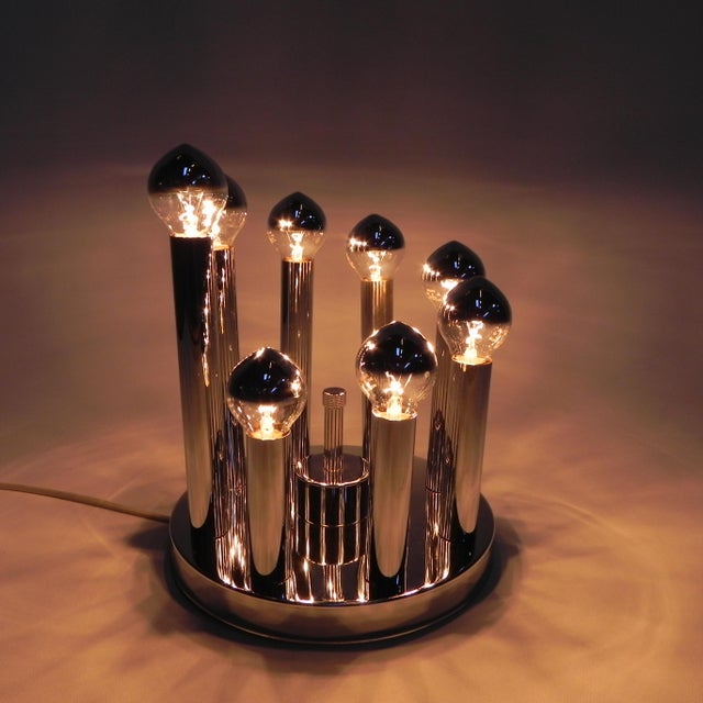 Height: 22 cm. ø: 22 cm. length of cylinders: from 9 to 19 cm. designed by gaetano sciolari for s.a. Boulanger. the lamp...