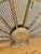 Vintage brass peacock fireplace screen with shell motif. Folds up for easy storage. Circa 1970s. Please see condition...