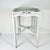 A delightful Shabby Chic Farmhouse Side Table that features a wood Gallery around the tabletop. These three table has...