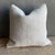 Creamy white hemp rug pillow with original seams. Soft hand, linen blend backing with zipper closure. Spot cleaning is...