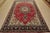 An authentic vintage traditional Tabriz rug hand-knotted with fine wool and natural dyes. This rug features a central...